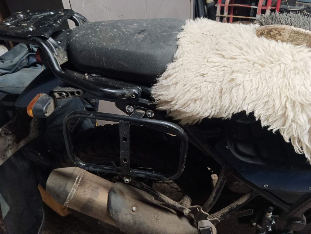 I initially used the two centre bolts on these mounts drilled through into the ammo can. That worked